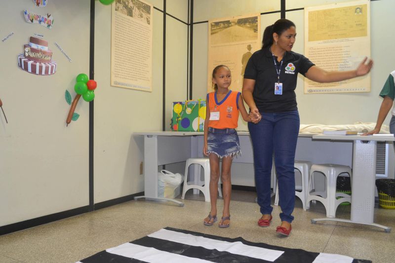 notícia: Biblioteca do Detran faz 15 anos e promove atividades em escola