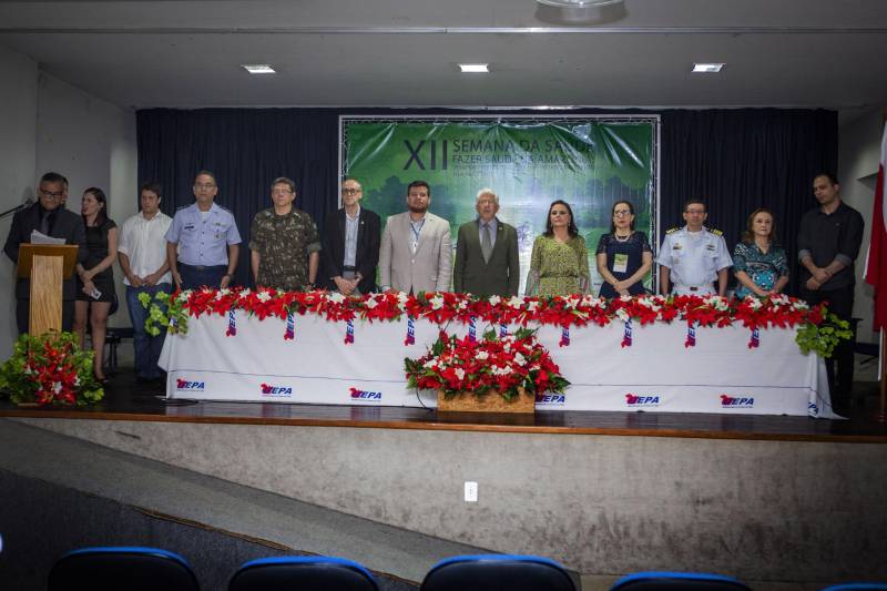Com o tema “Fazer saúde na Amazônia: desafios e perspectivas nas comunidades ribeirinhas”, a XII Semana da Saúde realizada pelo Centro de Ciências Biológicas e da Saúde (CCBS) da Universidade do Estado do Pará (Uepa) foi aberta na noite desta quarta-feira, 16.
FOTO: NAILANA THIELY / ASCOM UEPA
DATA: 17.05.2018
BELÉM - PARÁ <div class='credito_fotos'>Foto: Nailana Thiely / Ascom Uepa | <a href='/midias/2018/originais/49c1a25e-530f-4da9-96b3-529e0452e107.jpg' download><i class='fa-solid fa-download'></i> Download</a></div>