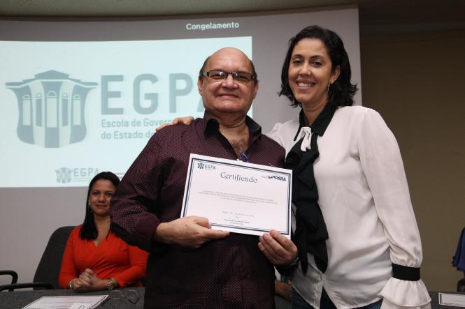 A Escola de Governança do Pará (EGPA) certificou, nesta sexta-feira (29), 114 servidores públicos municipais e estaduais pela participação em três cursos ofertados pelo órgão no período de 25 a 29 de março. A entrega dos documentos de conclusão da qualificação foi feita em cerimônia realizada na sede do órgão, em Belém.

FOTO: WAGNER SANTANA / AGÊNCIA PARÁ
DATA: 29.03.2019
BELÉM - PA <div class='credito_fotos'>Foto: Wagner Santana / Ag. Pará   |   <a href='/midias/2019/originais/d8fb0932-4678-44da-901b-5effa3aa37ab.jpg' download><i class='fa-solid fa-download'></i> Download</a></div>