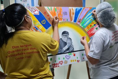 notícia: Funcionários do Oncológico se emocionam ao pintar tela colaborativa   