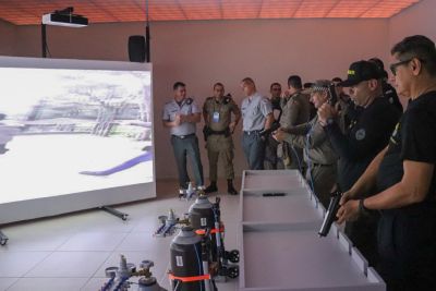 notícia: PM realiza teste no XI Simpósio de Oficiais de Material Bélico, no IESP, em Marituba