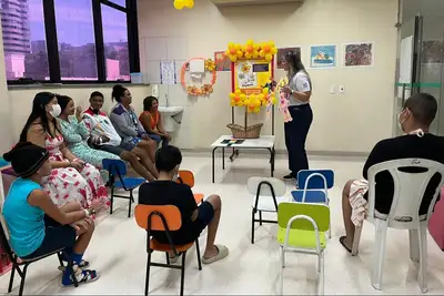 notícia: Hospital Octávio Lobo promove ação de conscientização pelo Maio Laranja